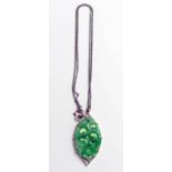 GREEN HARDSTONE PENDANT MARKED 9CT ON FINE CHAIN