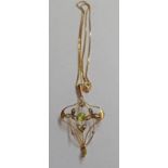 SEED PEARL & PERIDOT SET PENDANT MARKED 9CT ON CHAIN