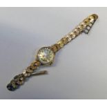 LADY'S ROTARY 9CT GOLD WRIST WATCH ON 9CT GOLD BRACELET Condition Report: Initials