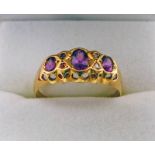 18CT GOLD RUBY SET RING WITH DIAMOND POINTS Condition Report: Ring size O.