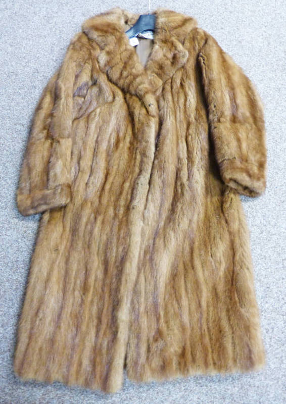 FUR COAT BY DOMINION FUR CO