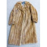 FUR COAT BY DOMINION FUR CO