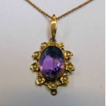 AMETHYST & PEARL SET PENDANT MARKED 9CT ON FINE CHAIN MARKED 9CT