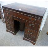 19TH CENTURY MAHOGANY KNEEHOLE DESK WITH SLIDE OVER LONG DRAWER OVER PANEL DOOR & 6 SHORT DRAWERS