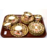 A Royal Crown Derby 2451 pattern Imari teaset, comprising eight cups, eight saucers, eight plates