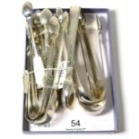 Ten pairs of silver sugar tongs of various dates and makers