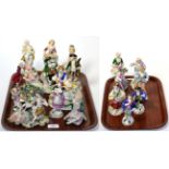 Twenty late 19th/early 20th century Continental figures (on two trays)