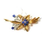 A 9ct gold sapphire, diamond and pearl spray brooch8.4 grams