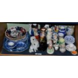 A quantity of 19th century ceramics including Staffordshire flat back figurers, seater poodles, Toby