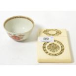A 19th century Chinese carved ivory card case and an 18th century Chinese tea bowl2.5cm stained