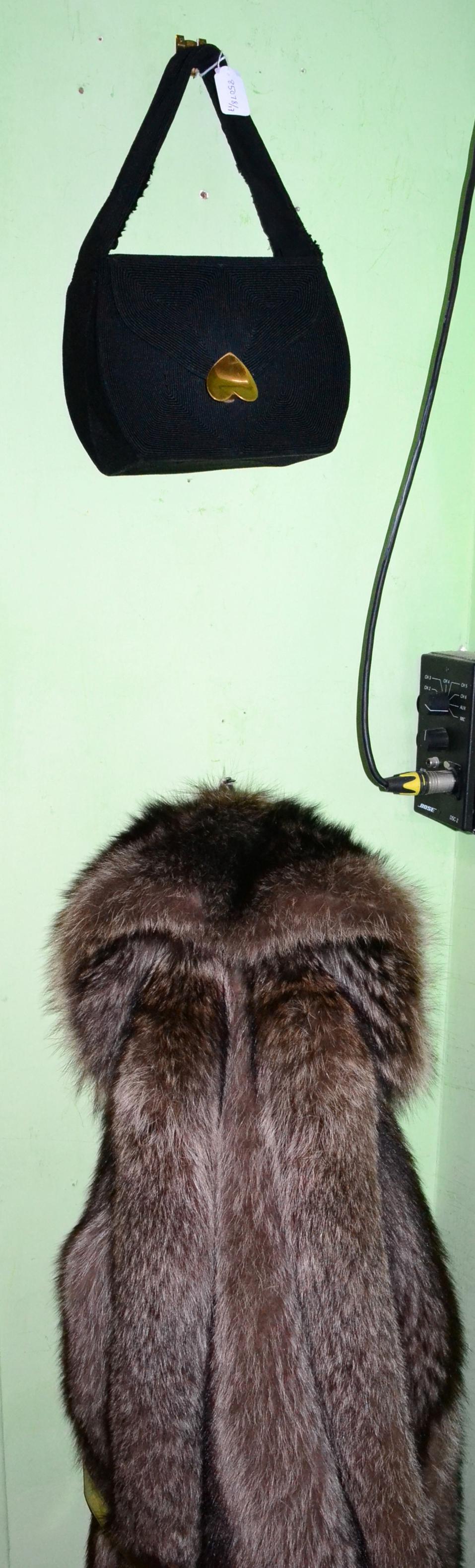 Fabian Mayfair styled racoon fur coat and a 1950's black Cordé handbag with gilt metal heart clasp