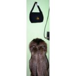 Fabian Mayfair styled racoon fur coat and a 1950's black Cordé handbag with gilt metal heart clasp