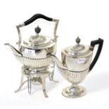 A silver kettle on stand and a silver coffee pot 60.1ozt