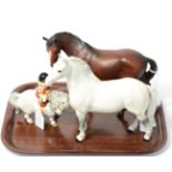 A Norman Thelwell for Beswick figure of a girl on a pony, together with two Beswick horses