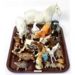 A collection of Beswick animals and two Beatrix Potter figures, many damaged, together with Wade