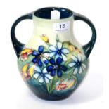 A William/Walter Moorcroft spring flowers pattern twin handled vase, impressed factory marks and