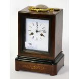 An inlaid striking mantel clock, enamelled dial signed, LeRoy A Paris