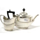 Silver teapot and cream jug 19.6ozt gross weight.