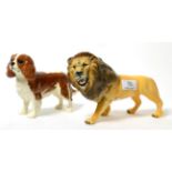 A Beswick figure of a lion and a Beswick King Charles spaniel