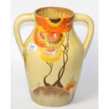 A Clarice Cliff twin handled lotus jug (cracked)