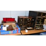 A quantity of watch makers parts including winding stems, balance staffs, hands, watch movements,