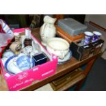 Two boxes of decorative ceramics including commemorative wares, a jug and a chamber pot, etc