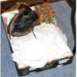 A box of assorted textiles, clogs etc