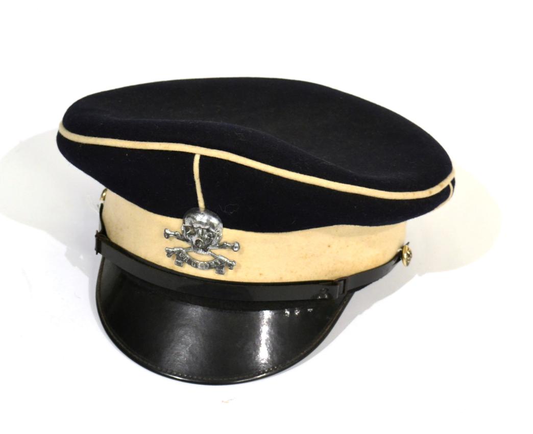 A Blue Tunic and Peaked Cap to a Sergeant of the 17th Lancers, the tunic with stand-up collar, white