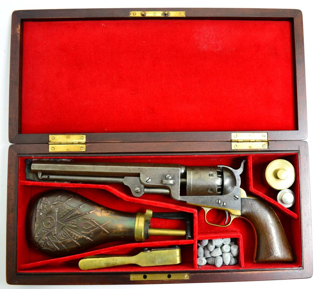 A Colt Model 1851 Navy Percussion Six Shot Single Action Revolver, .36 calibre, the 19cm octagonal