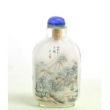 A Chinese Inside Painted Glass Snuff Bottle and Stopper, 20th century, painted with a scholar on a