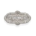 A Diamond Plaque Brooch, seven baguette cut diamonds channel set centrally, pavé set with round