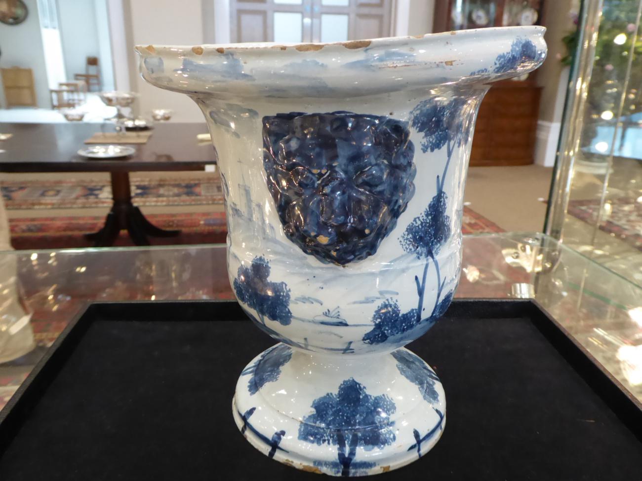 An English Delft Urn, probably London, circa 1760, of bell shape with lion's mask handles on a - Image 5 of 10