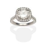 A Platinum Diamond Solitaire Ring, by Boodles, a round brilliant cut diamond within a halo of