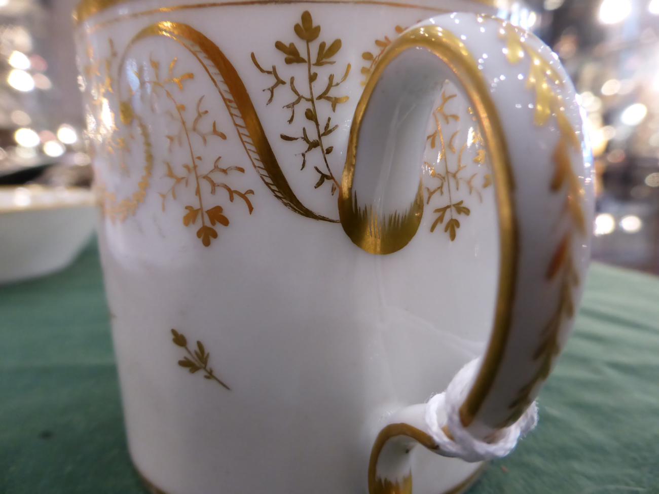 A Paris Porcelain Coffee Can and Saucer, circa 1790, painted with river landscapes, within gilt - Bild 5 aus 12