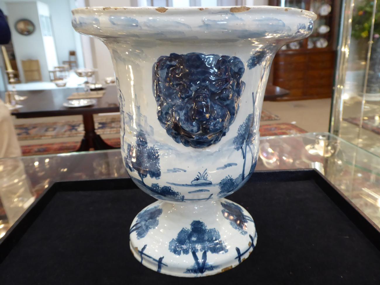 An English Delft Urn, probably London, circa 1760, of bell shape with lion's mask handles on a - Image 6 of 10