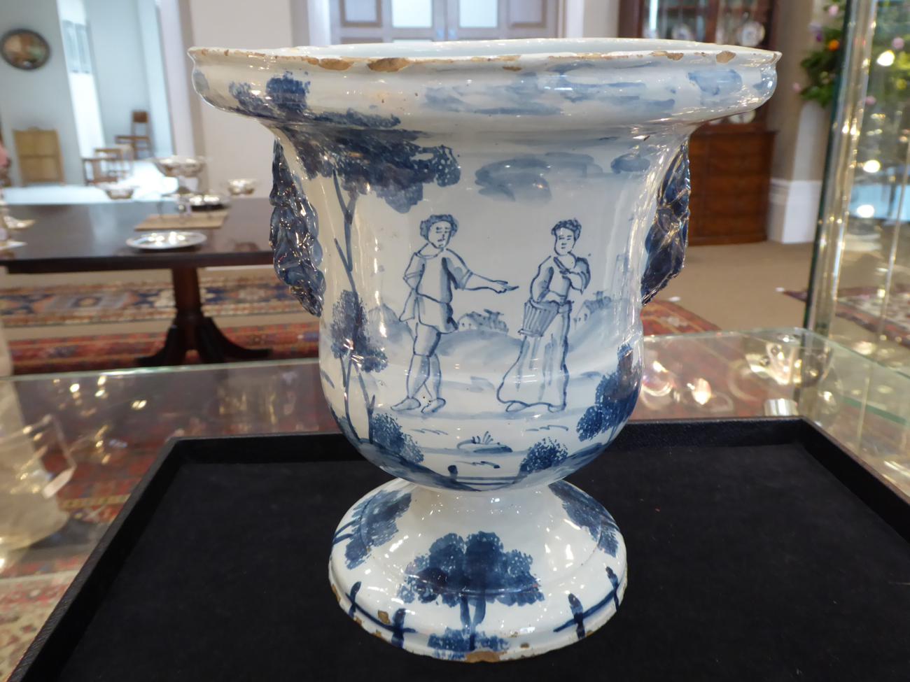 An English Delft Urn, probably London, circa 1760, of bell shape with lion's mask handles on a - Image 4 of 10