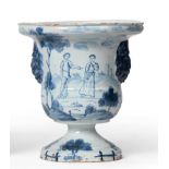An English Delft Urn, probably London, circa 1760, of bell shape with lion's mask handles on a