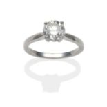 An 18 Carat White Gold Diamond Solitaire Ring, a round brilliant cut diamond in a white four claw