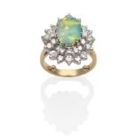 An Opal and Diamond Cluster Ring, an oval boulder opal within an undulating two tier border of round