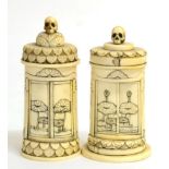 A Near Pair of Japanese Ivory Travelling Shrines, Meiji period, of oval section surmounted by skulls