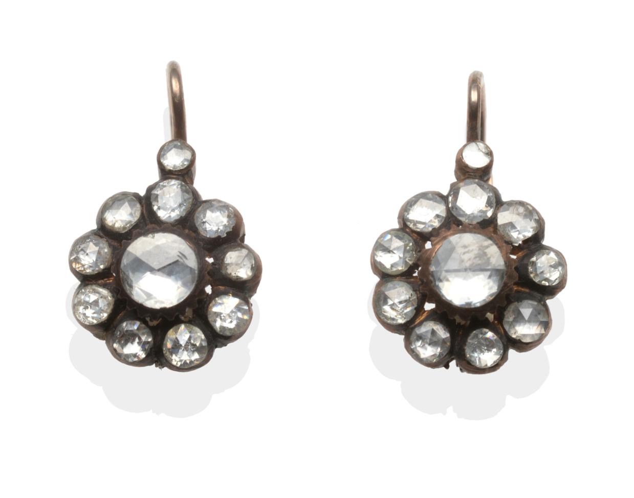 A Pair of Diamond Cluster Earrings, a rose cut diamond within a border of smaller rose cut