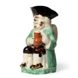 A Ralph Wood Type Toby Jug, circa 1780, of traditional form with manganese hat and green jacket