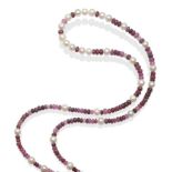 A Cultured Pearl and Ruby Necklace, cultured pearls spaced by groups of shaded faceted ruby beads of