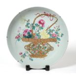 A Chinese Porcelain Charger, 19th century, painted in famille rose enamels and gilt with a basket of