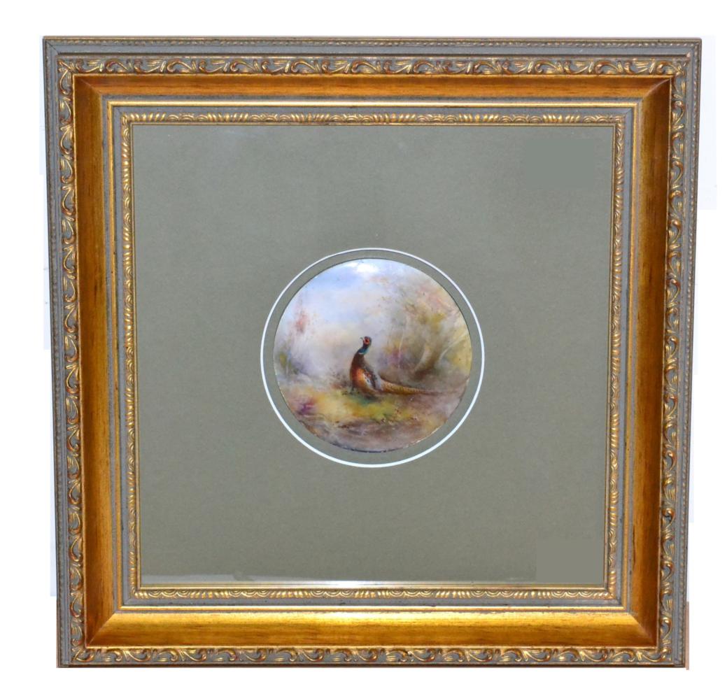A Royal Worcester Porcelain Plaque, 1926, painted by James Stinton with a pheasant in landscape,