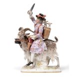 A Meissen Porcelain Figure of The Tailor, 20th century, after the model by J J Kaendler, riding a