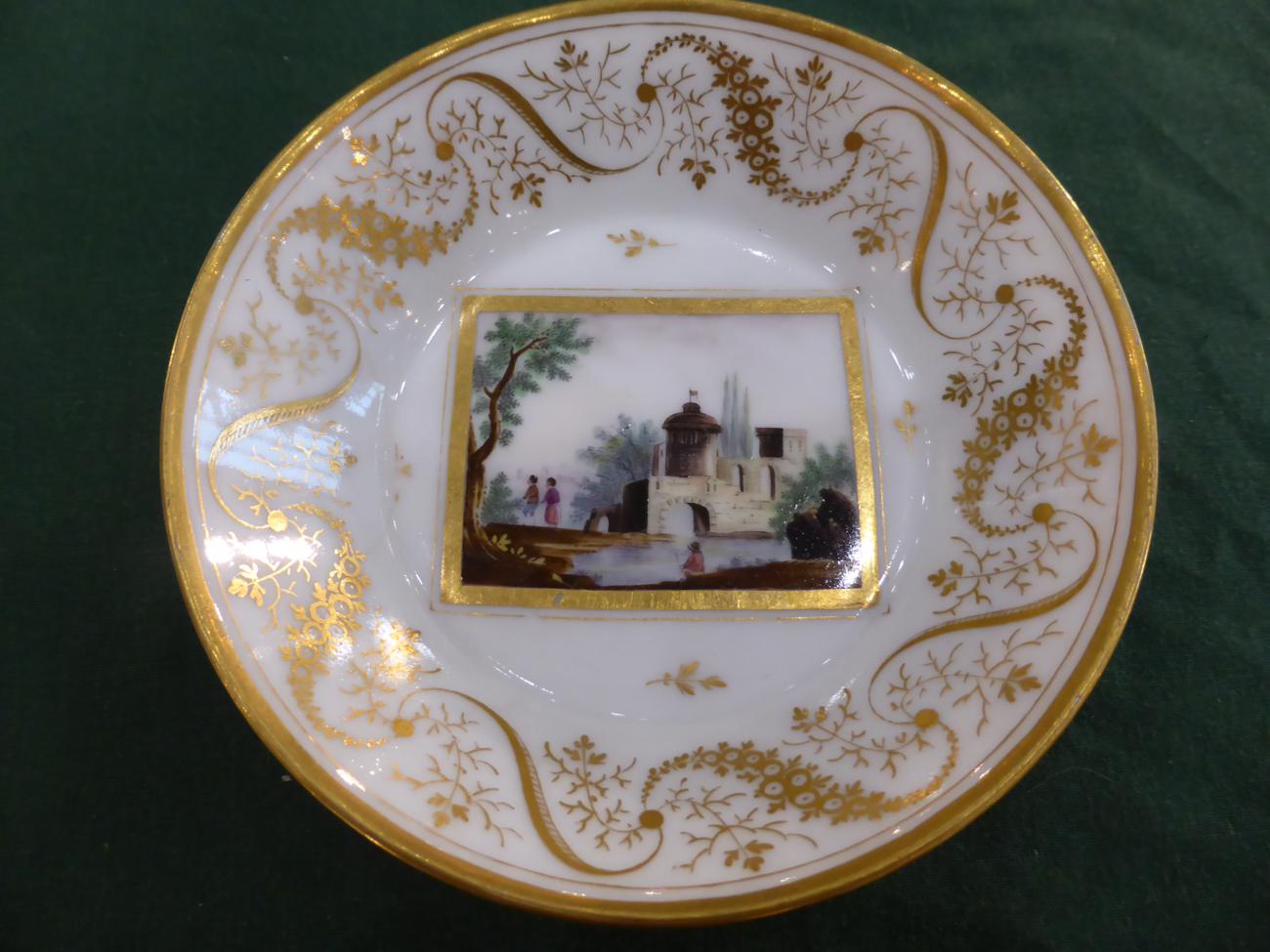 A Paris Porcelain Coffee Can and Saucer, circa 1790, painted with river landscapes, within gilt - Image 7 of 12