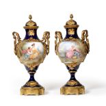 A Pair of Gilt Metal Mounted Sèvres Style Vases and Covers, 19th century, of baluster form with pine