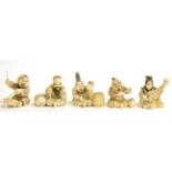 A Set of Five Japanese Ivory Okimonos of Musicians, Meiji period, each seated playing a variety of