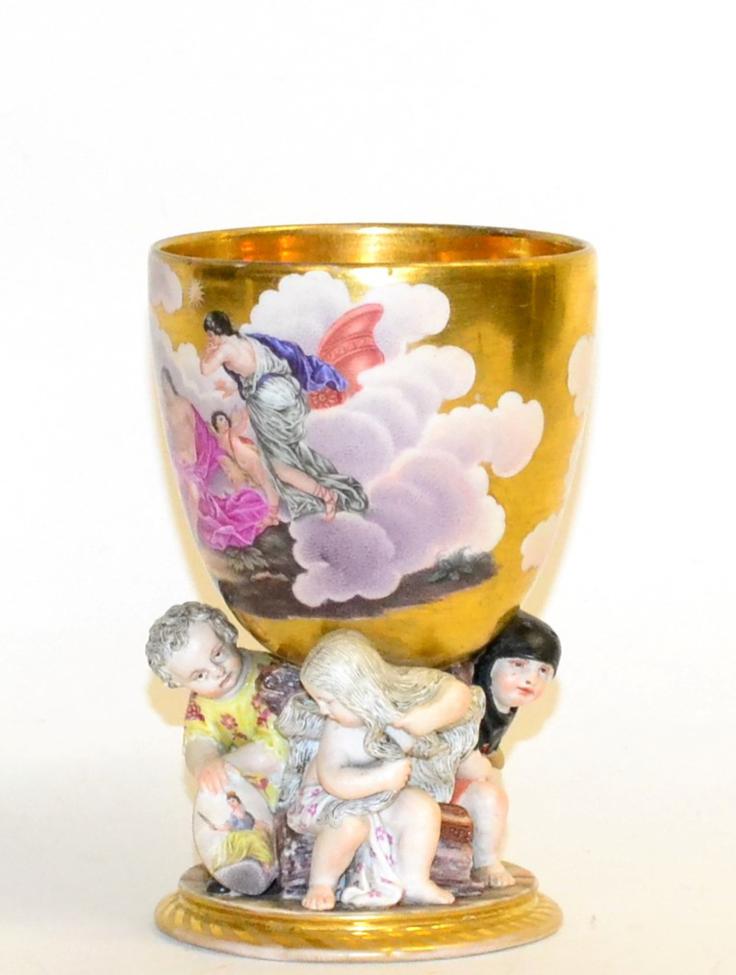 A Berlin Porcelain Figural Goblet, 19th century, the ovoid bowl painted with gods and goddesses